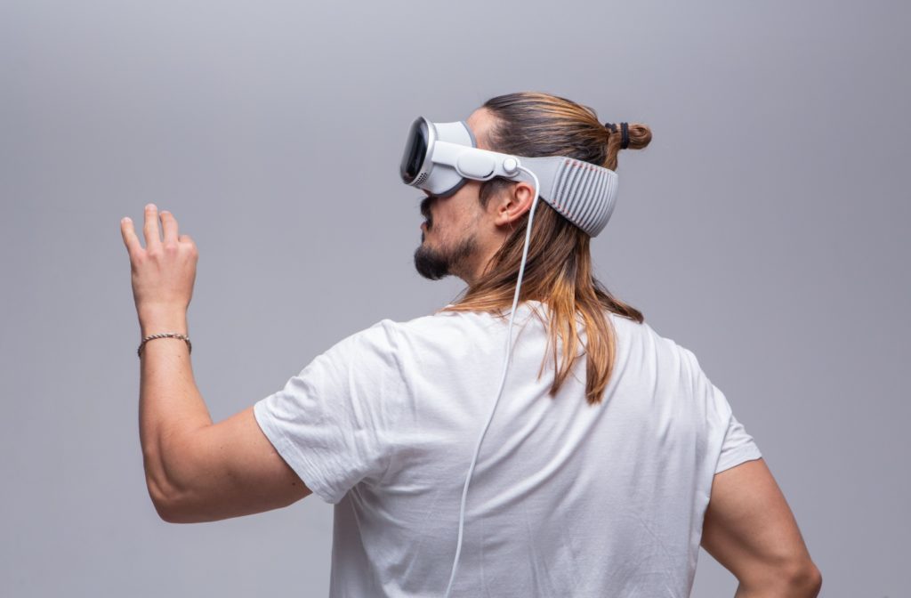 A man using a VR headset.